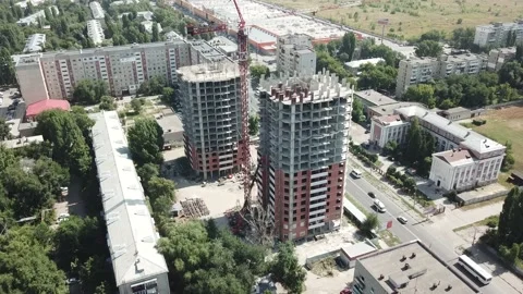 Aerial close in front of windows modern dormitory area houses buildings Stock Footage 136964866