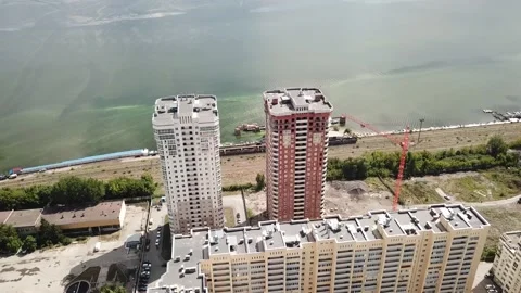 Aerial close in front of windows modern dormitory area houses buildings Stock Footage 136965551