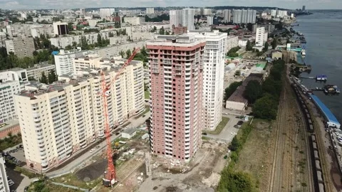 Aerial close in front of windows modern dormitory area houses buildings Stock Footage 136965667