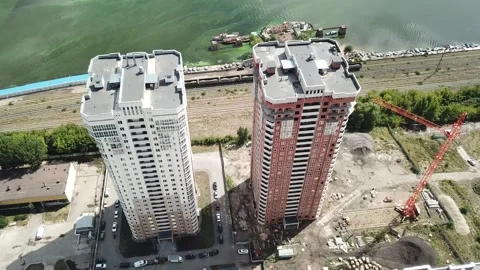 Aerial close in front of windows modern dormitory area houses buildings Stock Footage 136965836