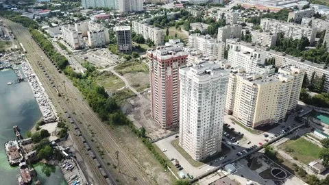 Aerial close in front of windows modern dormitory area houses buildings Stock Footage 136965954