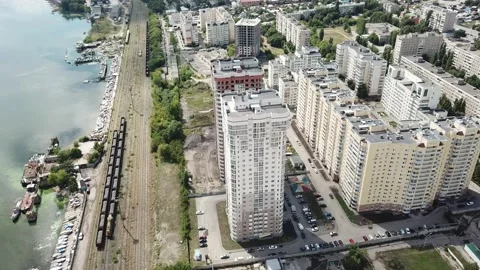 Aerial close in front of windows modern dormitory area houses buildings Stock Footage 136965991