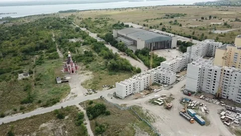 Aerial close in front of windows modern dormitory area houses buildings Stock Footage 136966064