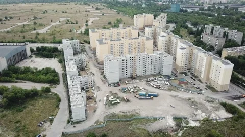 Aerial close in front of windows modern dormitory area houses buildings Stock Footage 136966694