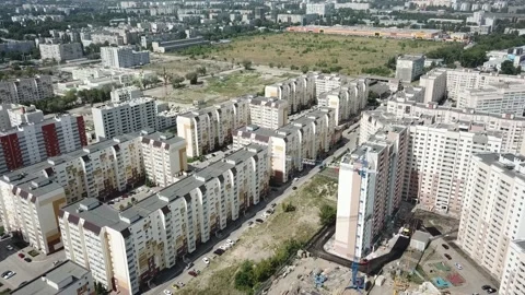 Aerial close in front of windows modern dormitory area houses buildings Stock Footage 136966890