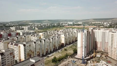 Aerial close in front of windows modern dormitory area houses buildings Stock Footage 136967089