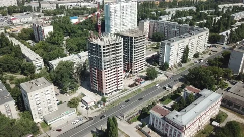 Aerial close in front of windows modern dormitory area houses buildings Stock Footage 136995076