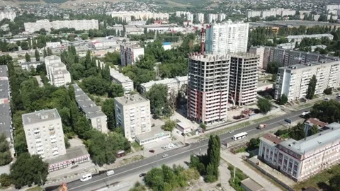 Aerial close in front of windows modern dormitory area houses buildings Stock Footage 137146185