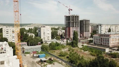 Aerial close in front of windows modern dormitory area houses buildings Stock Footage 137146204