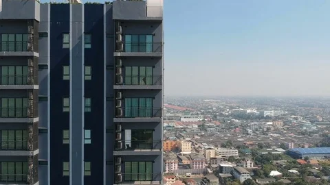 Aerial close up horizontal movement in front of a building Thailand 스톡 동영상 83811525