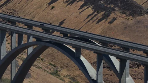 Aerial close up Interstate 82 arch bridge crossing in Yakima Washington Video stock 338313213