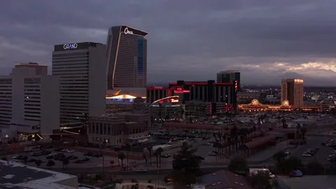 Aerial close-up push-in shot of downtown Las Vegas during sunset. 4K Stock Footage 229831472