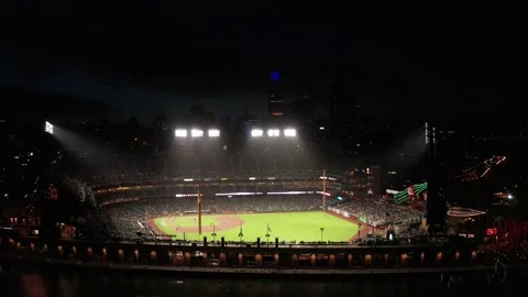 Aerial close-up quick panning shot of Oracle Park at night with San Stock-Footage 172480790