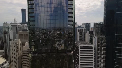 Aerial Close Up of Reflective Brisbane Skyscraper Wall Stock-Footage 333970567