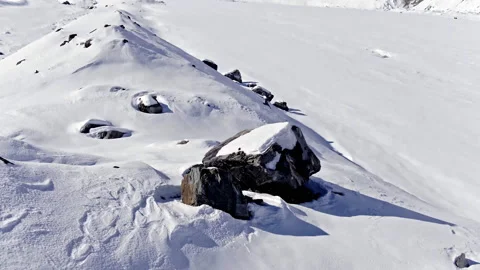 Aerial close up of rocks pull back to revel tasman glacier and mt cook Stock Footage 155413876