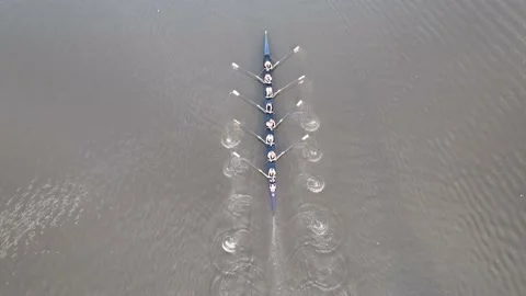 Aerial Close=up View of of Rowers Practicing on Cooper River Video stock 218277229