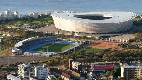Aerial closer view of both old and new stadiums in Green Point Cape Town Stock Footage 79363752