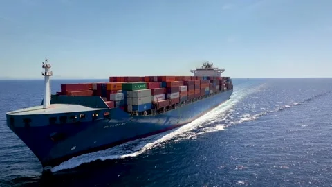 Aerial closeup view of the container cargo ship Buxcoast Stock Footage 262434286