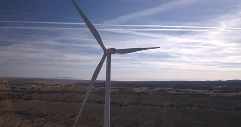 Aerial closeup view of single windmill in a wind farm Stock Footage 99546702