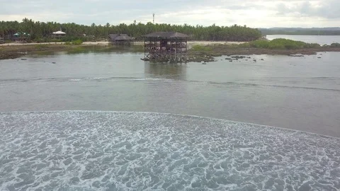 Aerial of Cloud 9 beach surfing spot Video stock 129441990