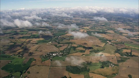 Aerial of clouds floating over the beautiful patchwork fields, Funen Island Stock Footage 109120145