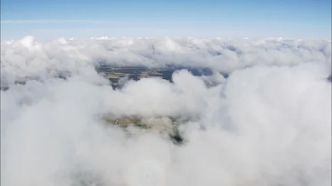 Aerial of clouds floating over the beautiful patchwork fields, Brenderup Stock Footage 109120250