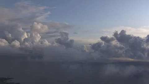 Aerial of clouds over sea sunset Stock Footage 87697865