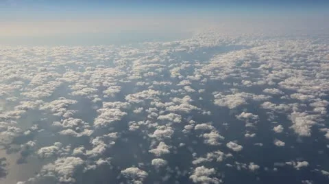 Aerial - Clouds from plane Stock Footage 13249374