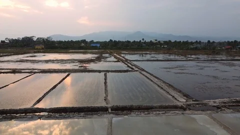 AERIAL Clouds Reflecting In The Salt Fields Of Kampot, Cambodia Stock Footage 125977636