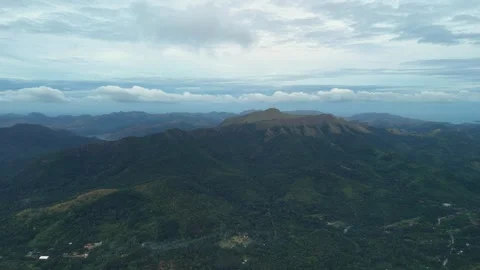 Aerial Cloudy Mountain Range Over Coron Forested Hills Vídeo Stock 335517448