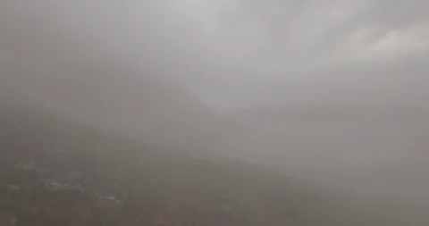 Aerial of Cloudy Mountains fast Stock Footage 87698050