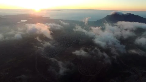 Aerial of Cloudy Orange Sunset Stock Footage 92033413