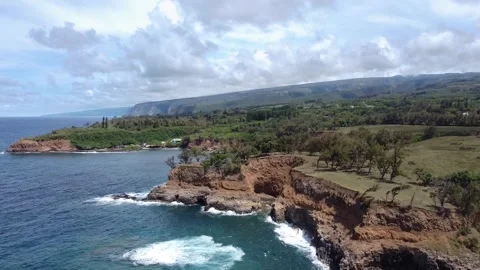 Aerial Coastal Cliffs of the Big Island Hawaii with Waves Crashing Stock Footage 320019084