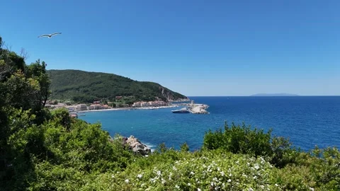 Aerial Coastal View with Cliffs and Clear Blue Sea (4K Drone Footage) Stock Footage 310179264