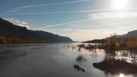 Aerial of the Columbia River Gorge over the river rising shot Stock Footage