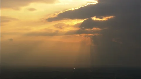 Aerial of column monument surrounded with trees and town houses Stock Footage 109437608