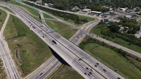 Aerial of complex highway interchange in Kansas City Missouri Stock Footage 344810757