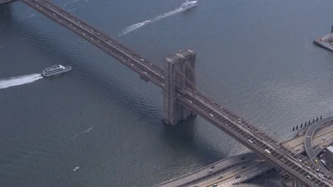 AERIAL: Congested traffic on busy Brooklyn bridge highway interchange overpass Stock Footage 71609318