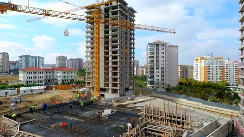 Aerial Construction crane working, constructing a modern building  Vidéo 80871037