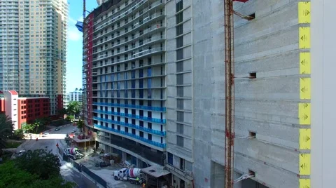 AERIAL - Construction elevator going up on building.mp4 Stock Footage 65154023