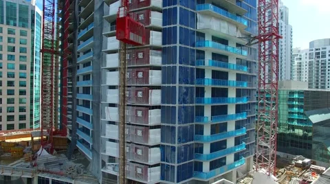 AERIAL - Construction elevator in Miami Stock Footage 65153971