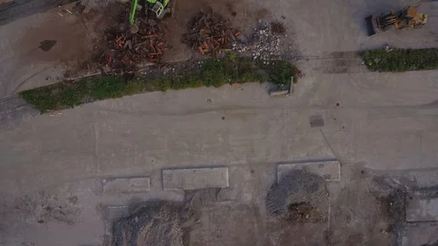 Aerial of construction equipment moving trees Video stock 90608583