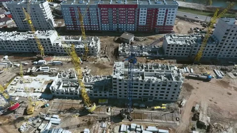 Aerial of construction site of several multistory buildings Stock Footage 130995109