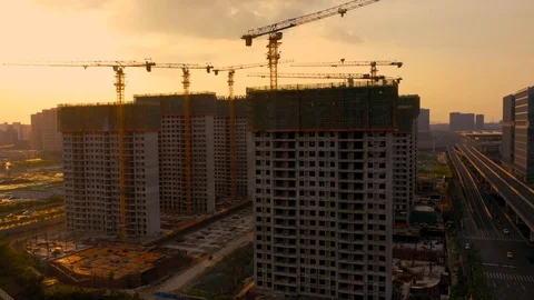 Aerial of construction site at sunset Stock Footage 115049410