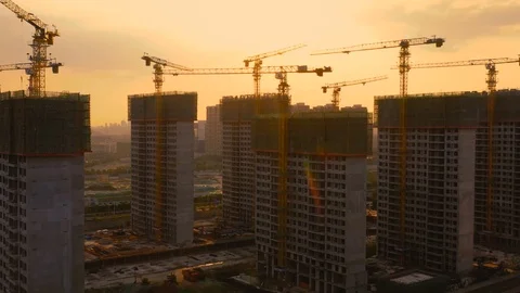 Aerial of construction site at sunset Видео 115049556