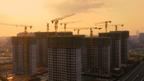 Aerial of construction site at sunset Stock Footage 115049746