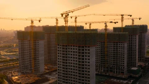 Aerial of construction site at sunset 스톡 동영상 115049960