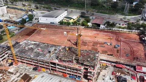 Aerial Construction Site with Yellow Tower Cranes and Concrete Building Stock-Footage 344478028