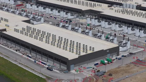 Aerial construction view of a large scale AI data center facility Stock Footage 336291919