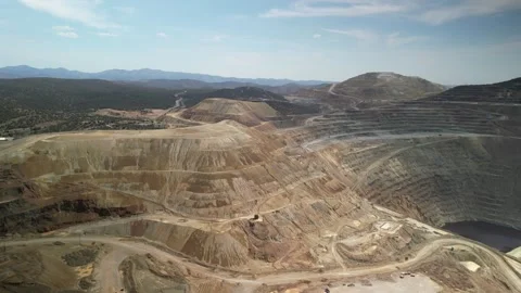 Aerial of copper mining area in New Mexico near Silver City in mountains Stock Footage 332183308